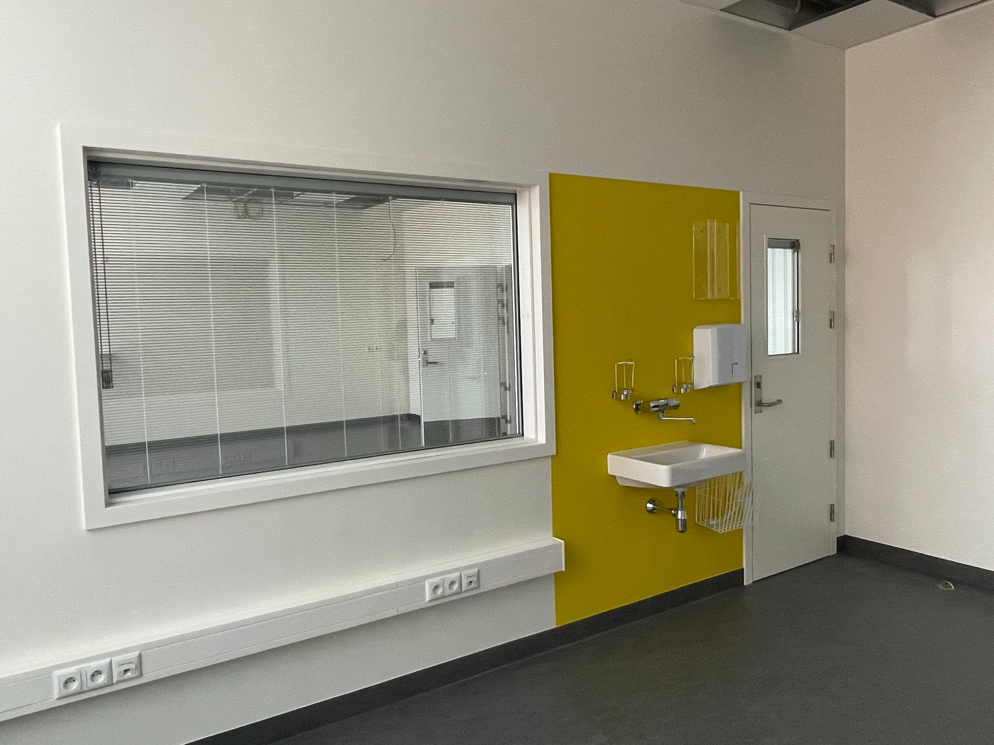 Interior glazed window in healthcare setting