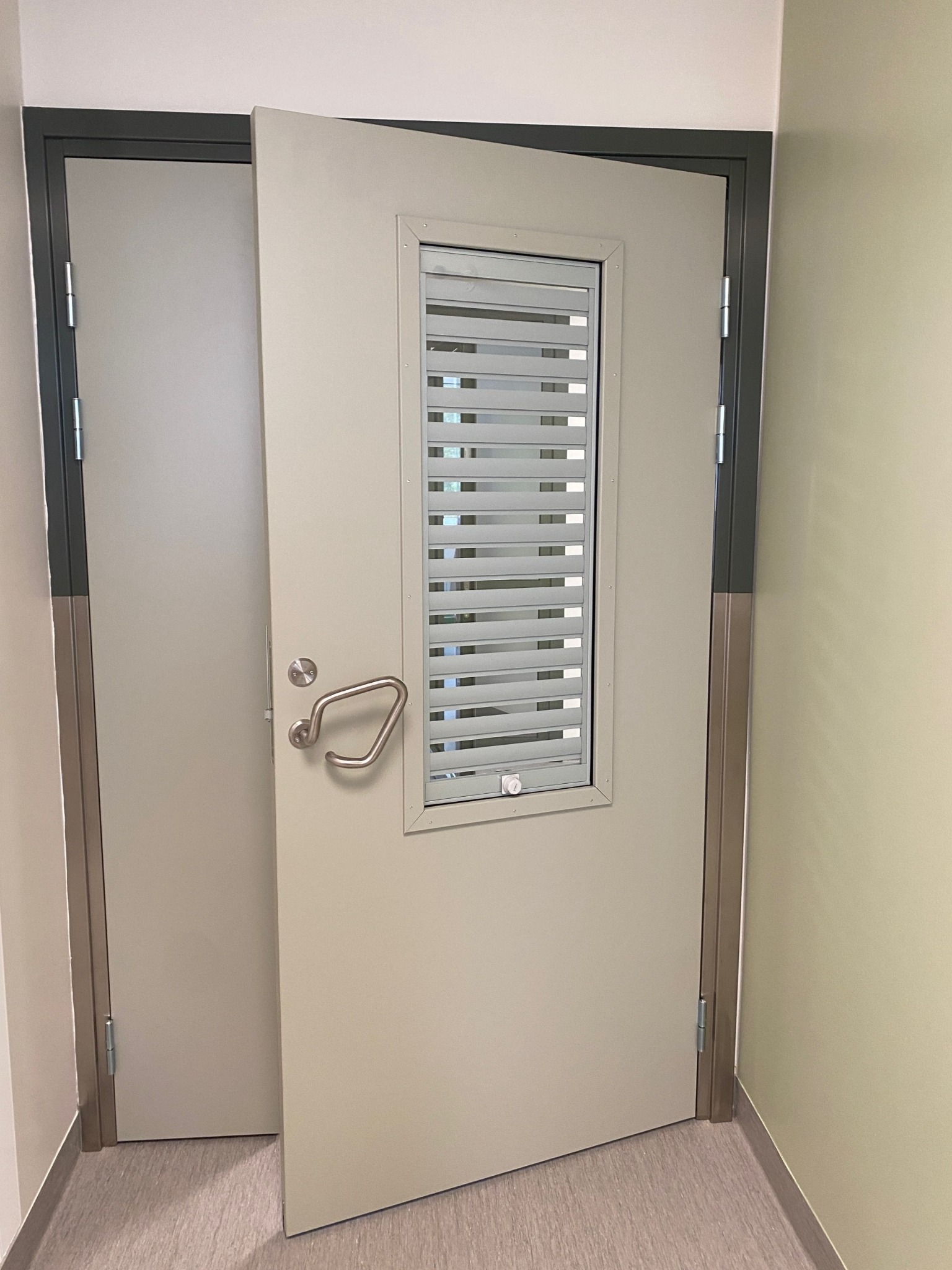 Interior door with glazed vision panel